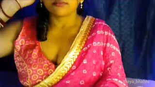 Alluring Bhabhi opens her clothes and shows her titties to satisfy her sexual desire.
