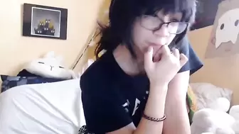 Cute Asian Teen Playing with her Manga Doll