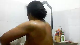 Sexy Indian Bengali Aunt Mili captured in bathroom Part 2