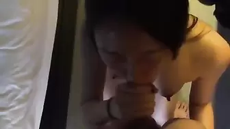 Asian slut sucks his cock and gets facialized