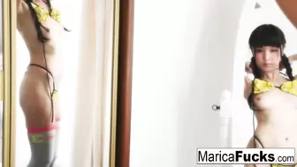 Marica dresses up and fingers her cunt