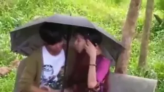 Oral Sex - Indian teenage chick swallowing under Umbrella